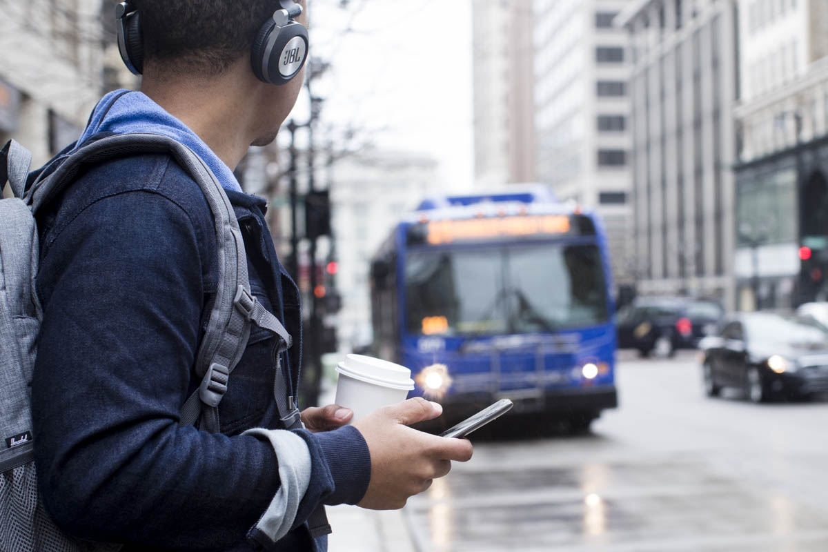 Guy waiting for the bus.